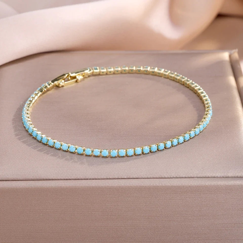 Aurora | Pulsera de tenis dorada y turquesa