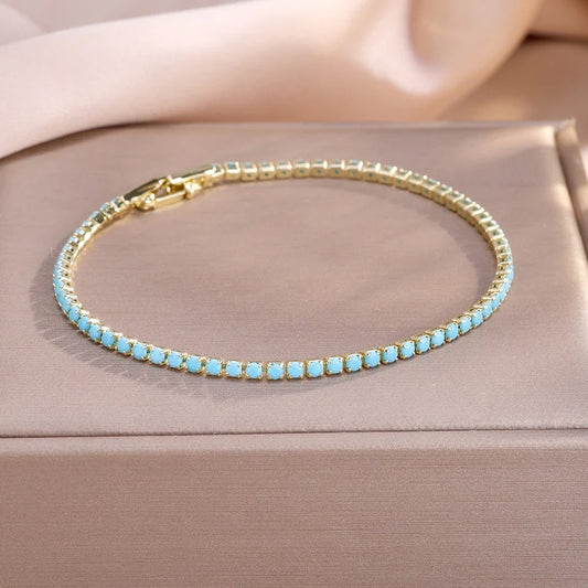 Aurora | Pulsera de tenis dorada y turquesa