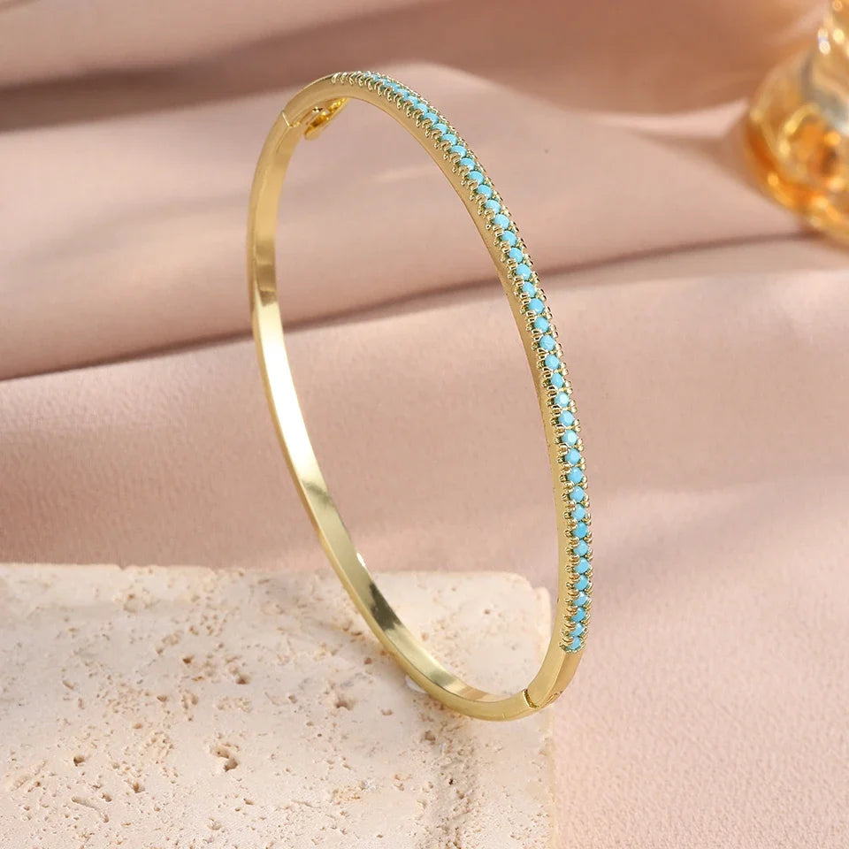 Aurora | Pulsera de tenis dorada y turquesa